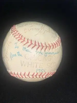 Vintage Chicago White Sox signed baseball with red stitching and faded ink inscriptions