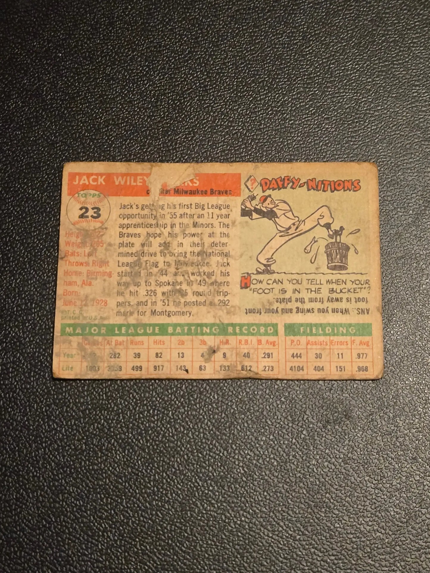 Aged 1955 Topps Jack Parks baseball trading card with cartoon illustration
