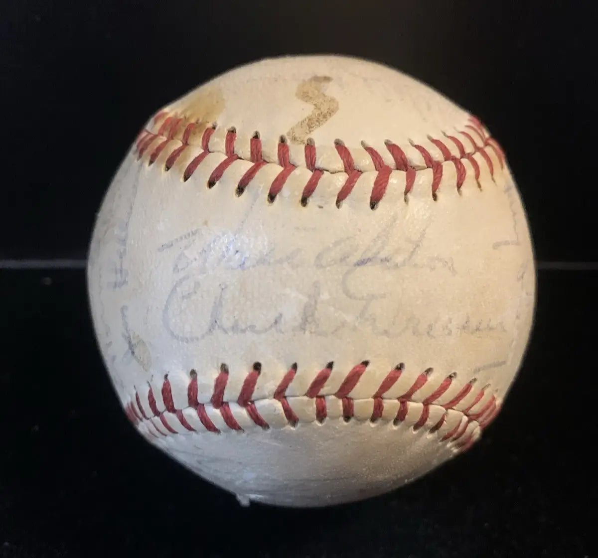 Autographed Los Angeles Dodgers team signed baseball with red stitching for collectors
