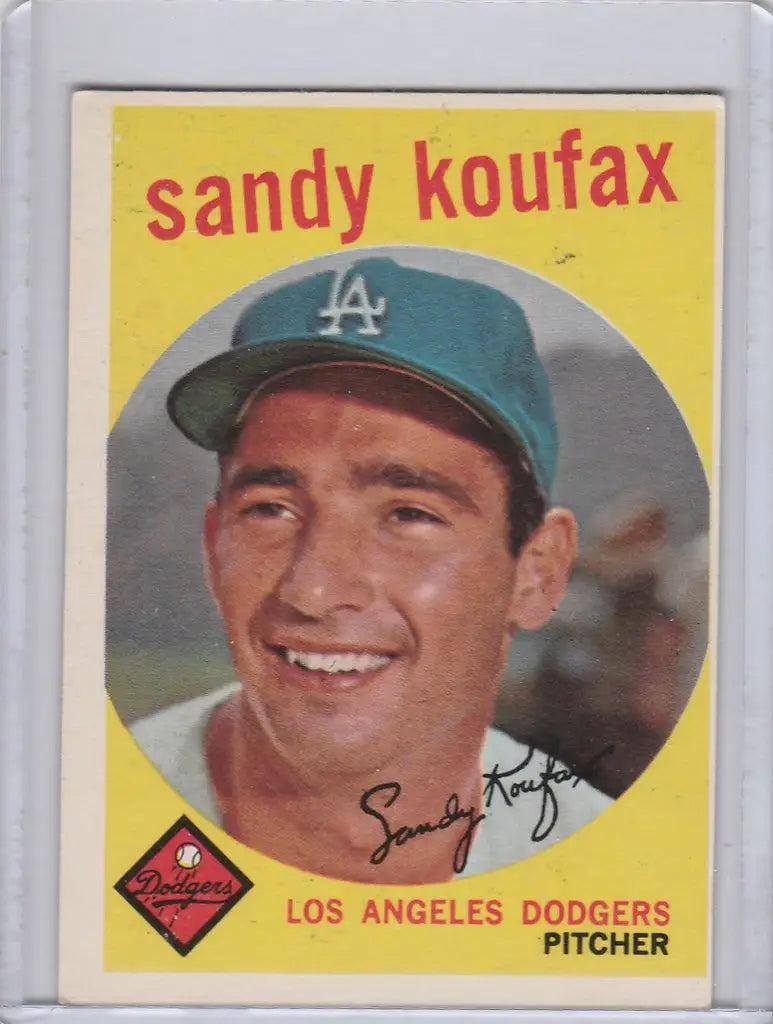 Baseball card of Sandy Koufax, smiling Los Angeles Dodgers pitcher in blue cap