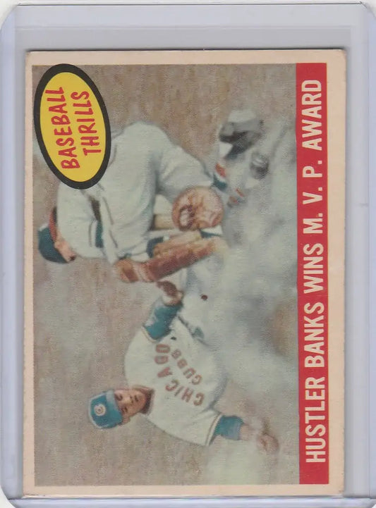 Vintage 1959 Topps baseball card of Ernie Banks Wins MVP sliding into base for Chicago Cubs