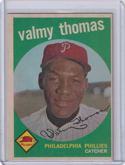Baseball card of Valmy Thomas, Philadelphia Phillies catcher in red cap, Topps Baseball