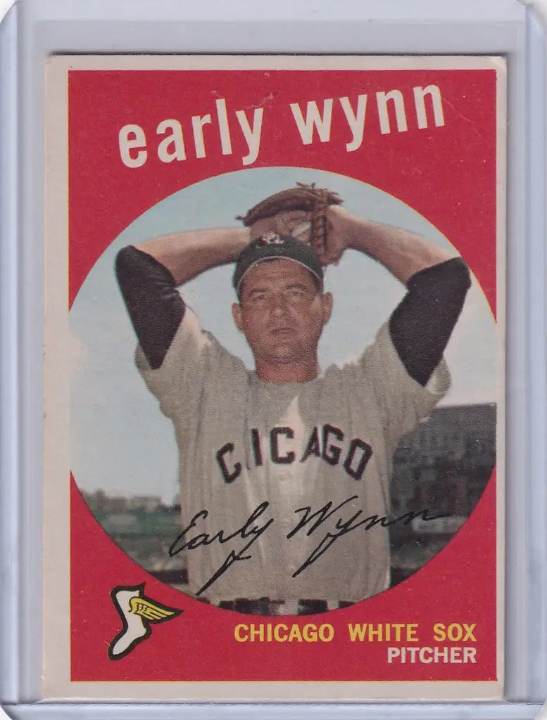Vintage Topps Baseball card of Early Wynn pitching for the Chicago White Sox