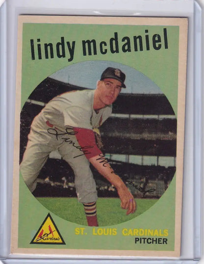 Vintage Topps Baseball card of Lindy McDaniel in throwing stance for St. Louis Cardinals