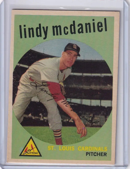 Vintage Topps Baseball card of Lindy McDaniel in throwing stance for St. Louis Cardinals