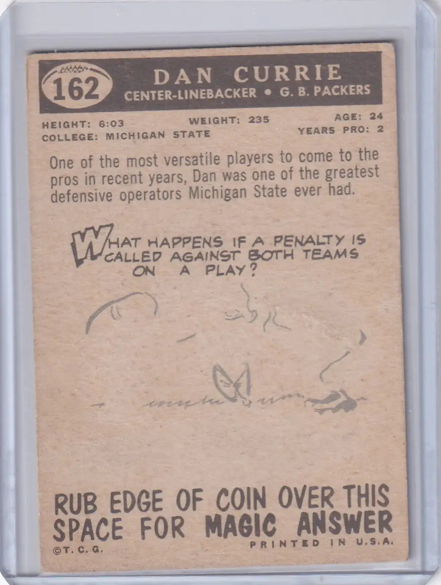Vintage Topps Football card of Dan Currie from Green Bay Packers with scratch-off feature