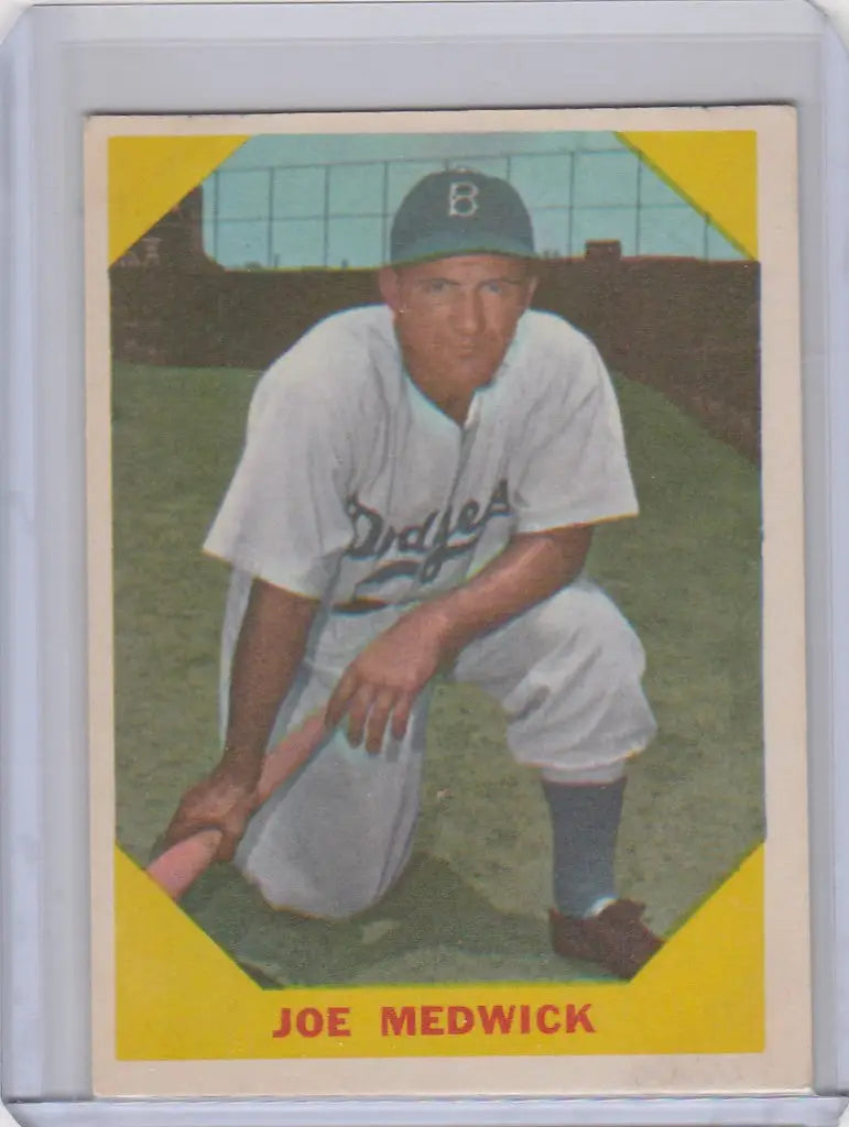 Vintage baseball card of Joe Medwick kneeling with Brooklyn Dodgers, Fleer Baseball Greats
