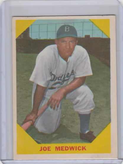 Vintage baseball card of Joe Medwick kneeling with Brooklyn Dodgers, Fleer Baseball Greats