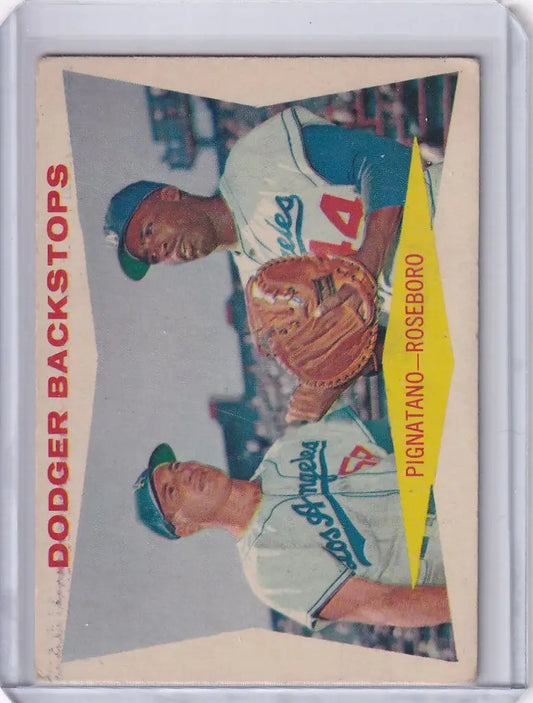 Vintage baseball card featuring Dodger Backstops Pignatano and Roseboro in uniform