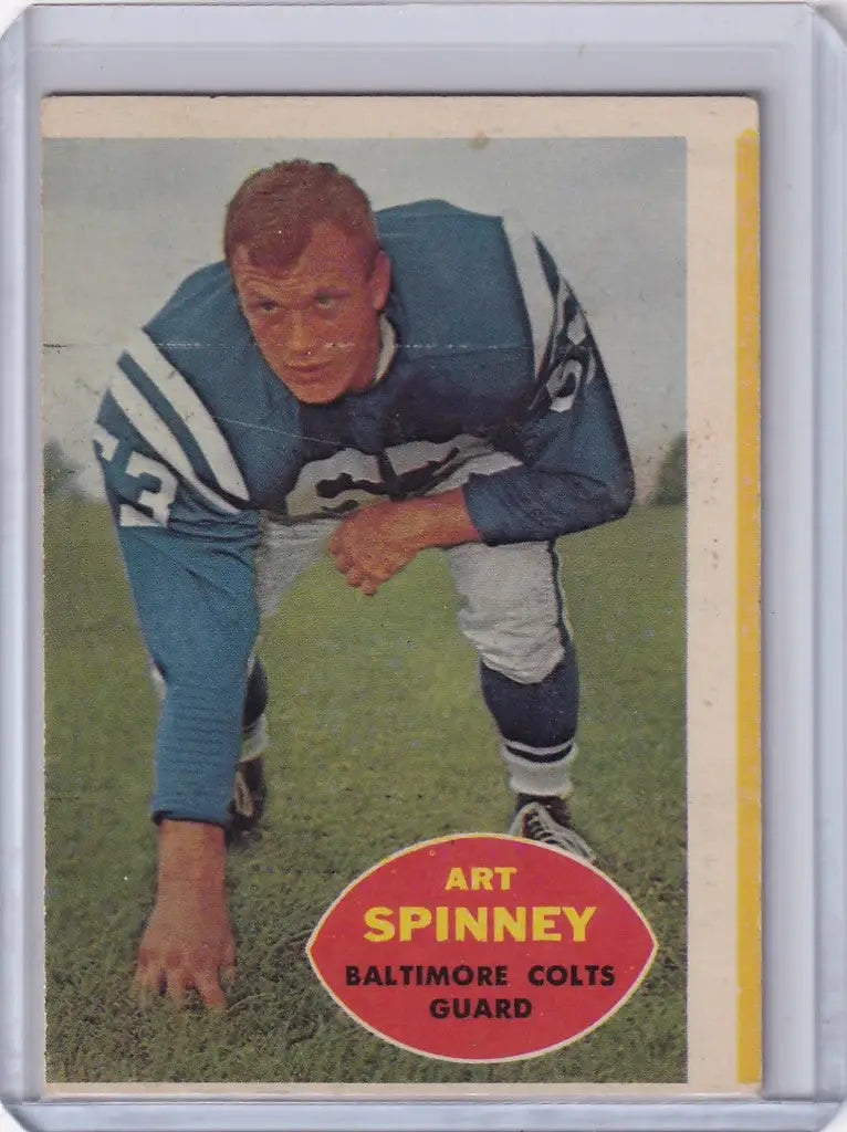 Vintage Topps Football trading card of Art Spinney in three-point stance for Baltimore Colts