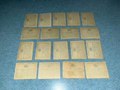 Vintage paper documents showcasing 1961 Fleer Baseball Team logo decals for collectors