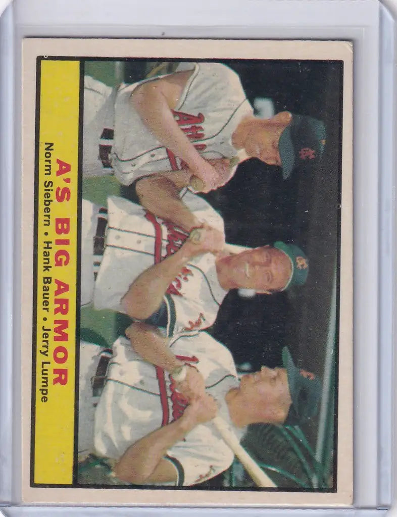Baseball card of Norm Siebern and Hank Bauer in dugout from 1961 Topps Big Armor series