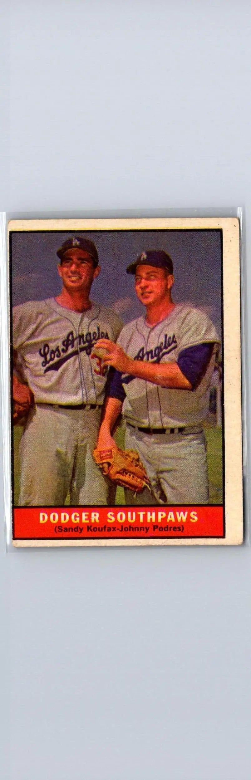 Vintage 1961 Topps #207 Dodger Southpaws card featuring Sandy Koufax and Johnny Podres