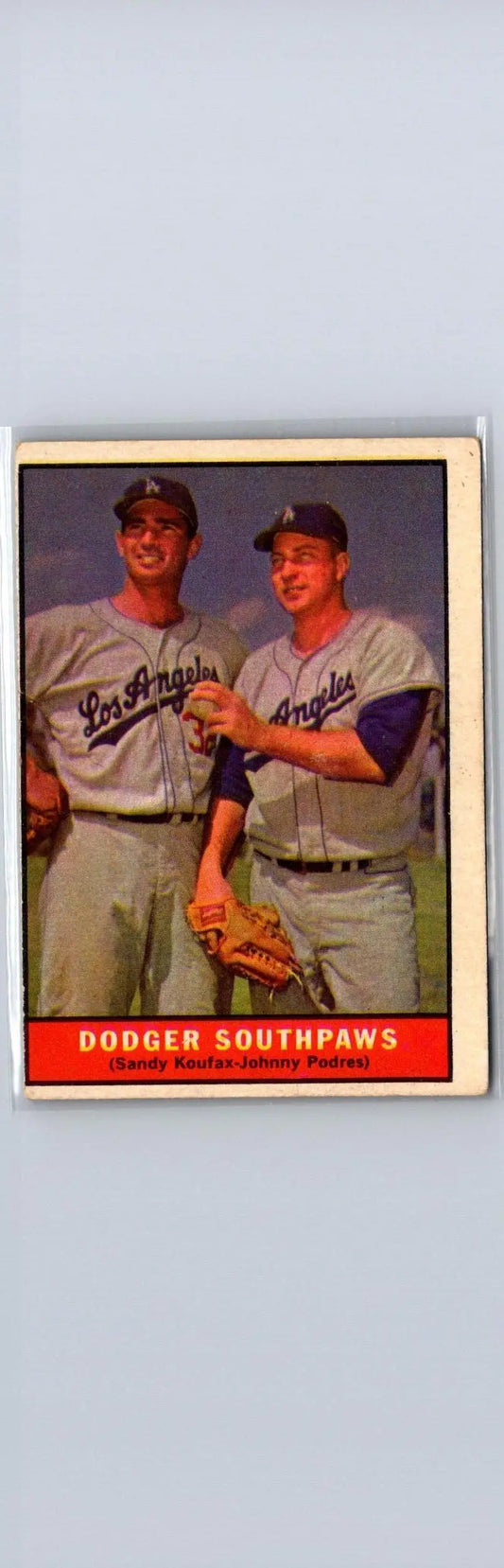 Vintage 1961 Topps #207 Dodger Southpaws card featuring Sandy Koufax and Johnny Podres