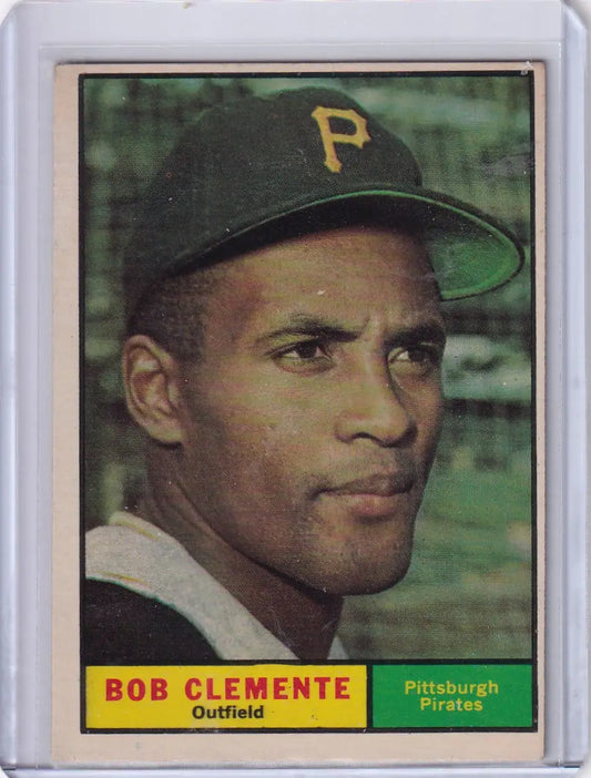 Vintage baseball card of Roberto Clemente in protective sleeve from 1961 Topps Pittsburgh Pirates
