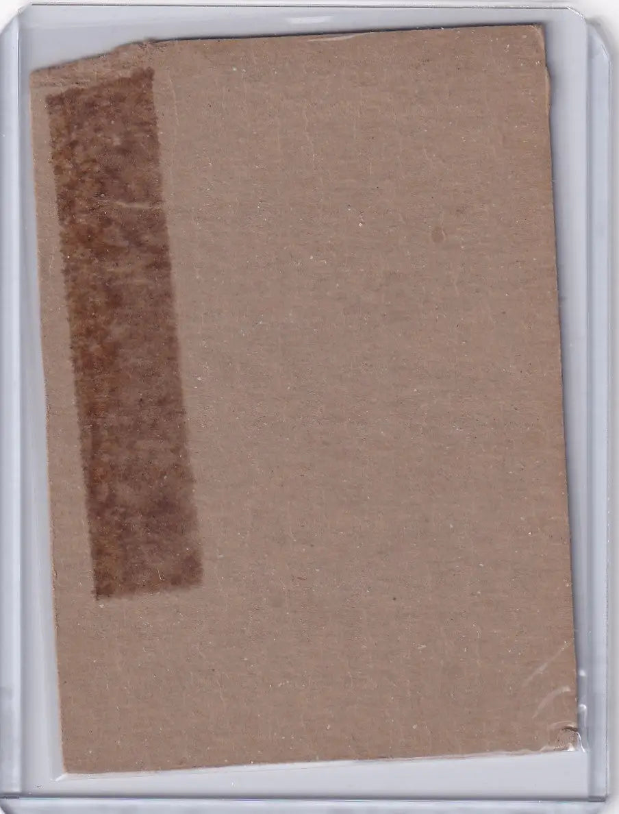 Back of a blank brown trading card with tape edge featuring Willie Mays San Francisco Giants