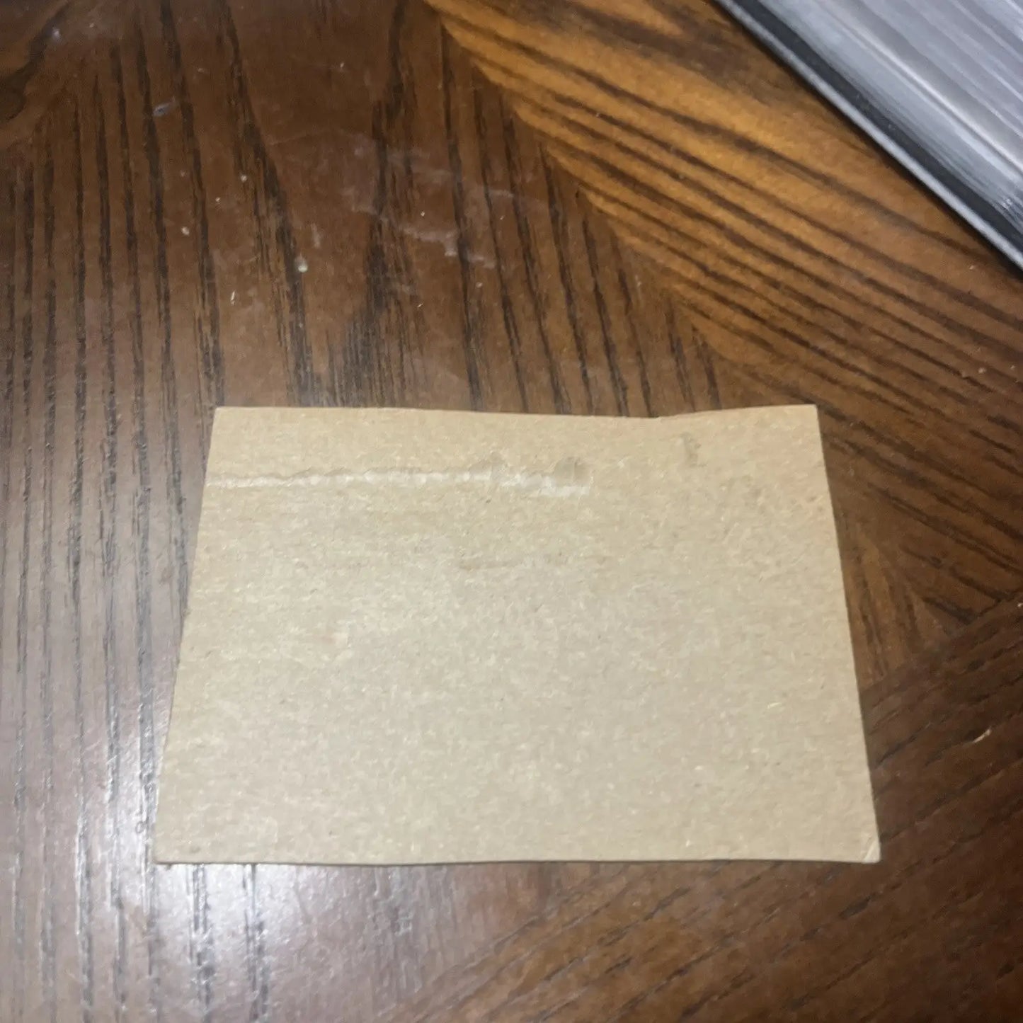 Rectangular beige textured tile from 1962 Post trading card featuring Brooks Robinson HOF