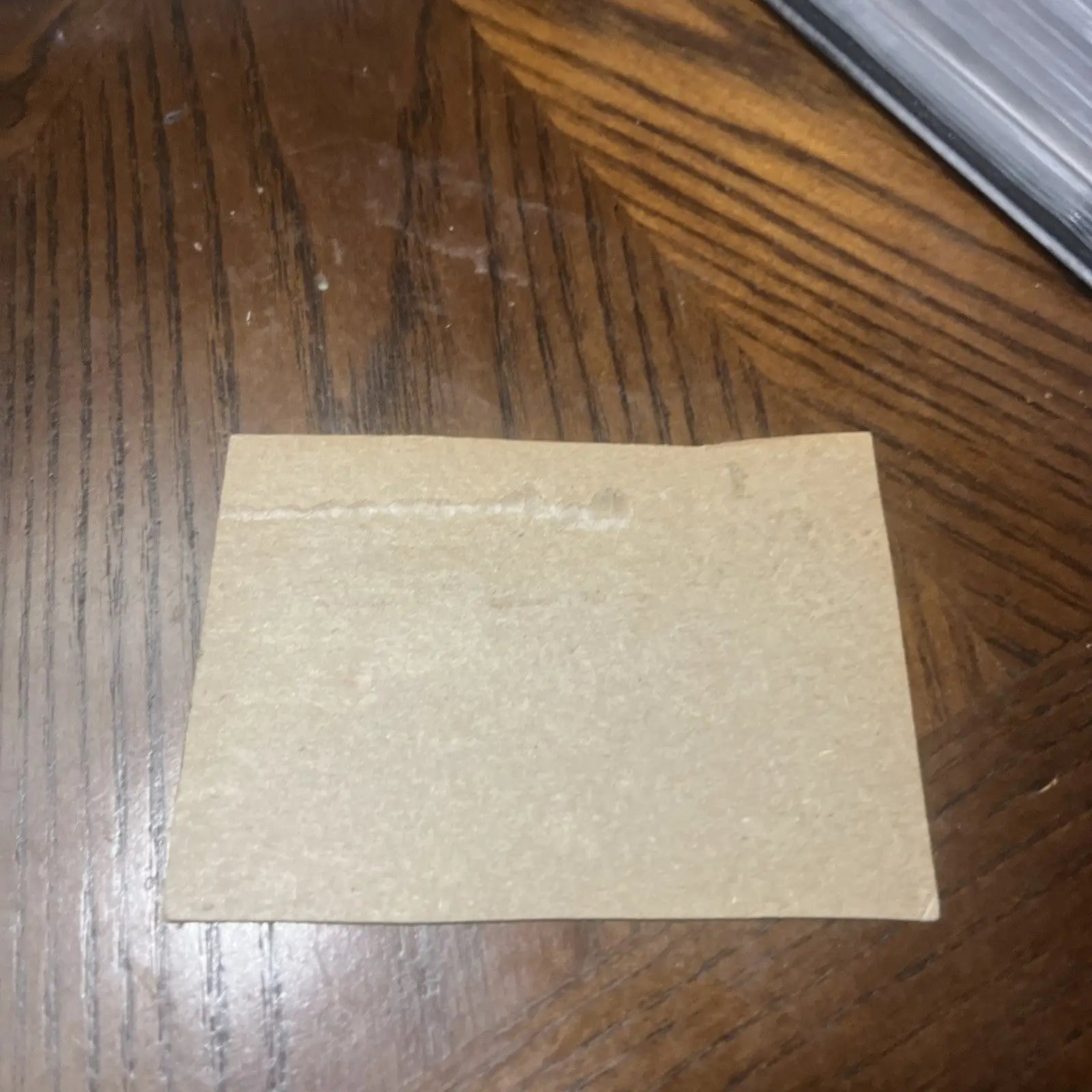 Rectangular beige textured tile from 1962 Post trading card featuring Brooks Robinson HOF