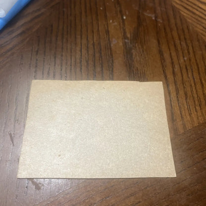 Rectangular piece of cardboard from the 1962 Post Rocky Nelson trading card series