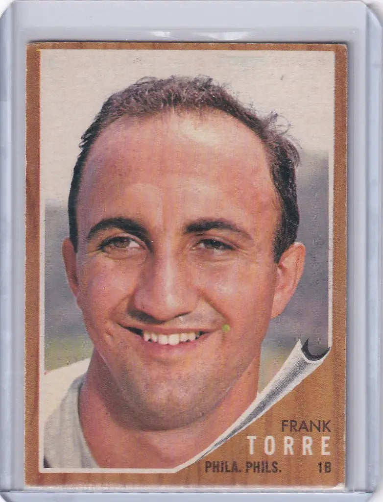 Baseball card of Frank Torre in a light uniform for the Philadelphia Phillies