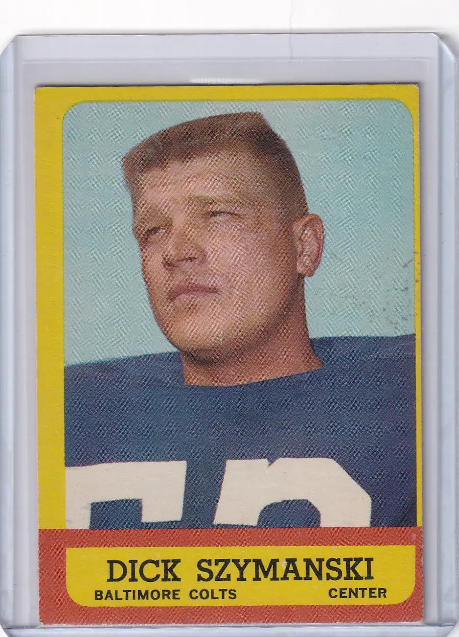 Vintage 1963 Topps Football card of Dick Szymanski from the Baltimore Colts in blue jersey