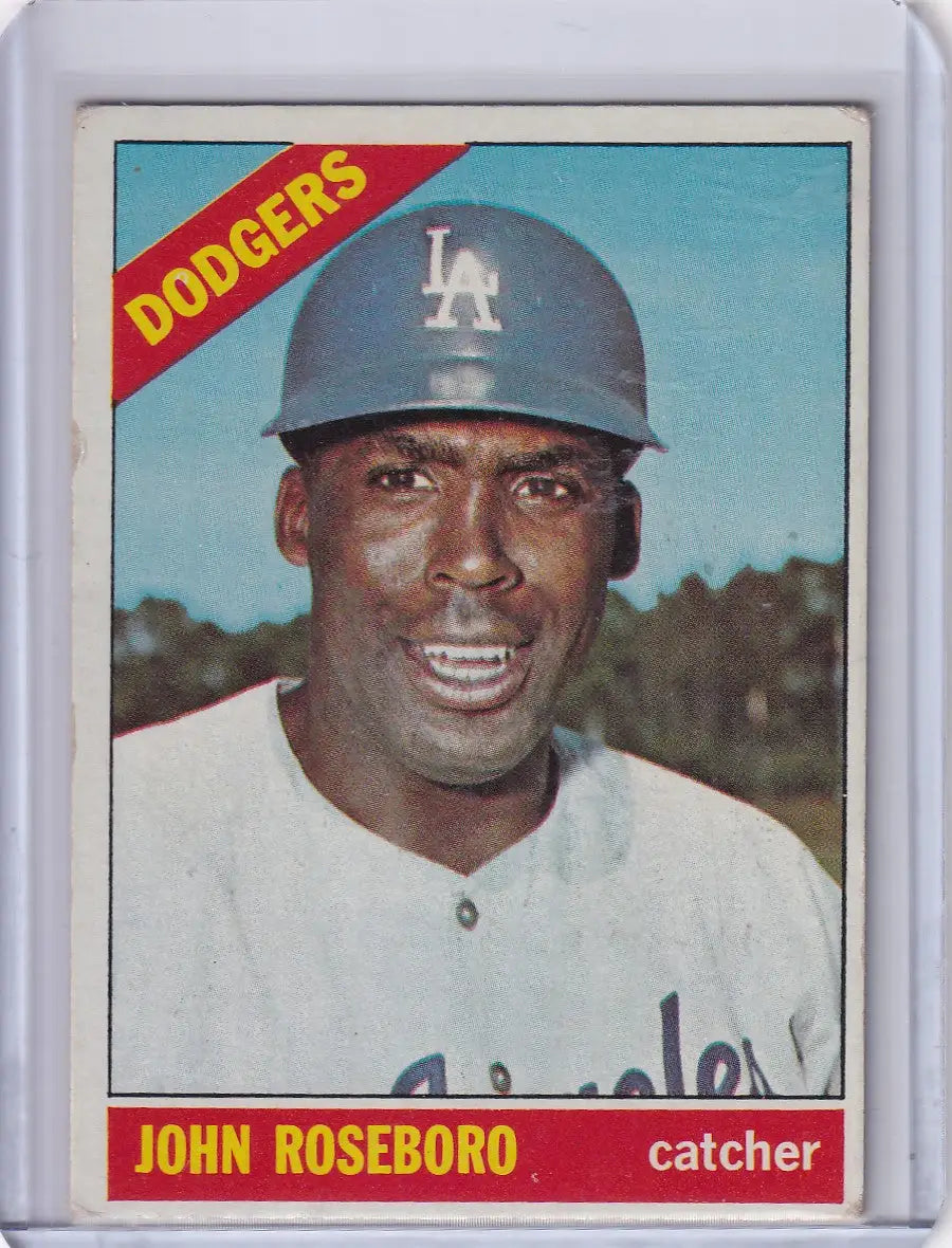 Baseball card of John Roseboro, smiling Dodgers catcher in blue cap and white uniform