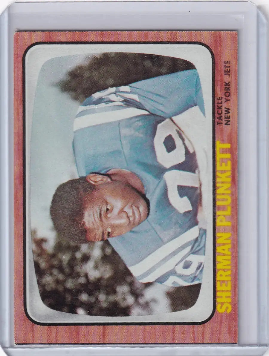Vintage 1966 Topps Football card of Sherman Plunkett, New York Jets player, jersey number 20