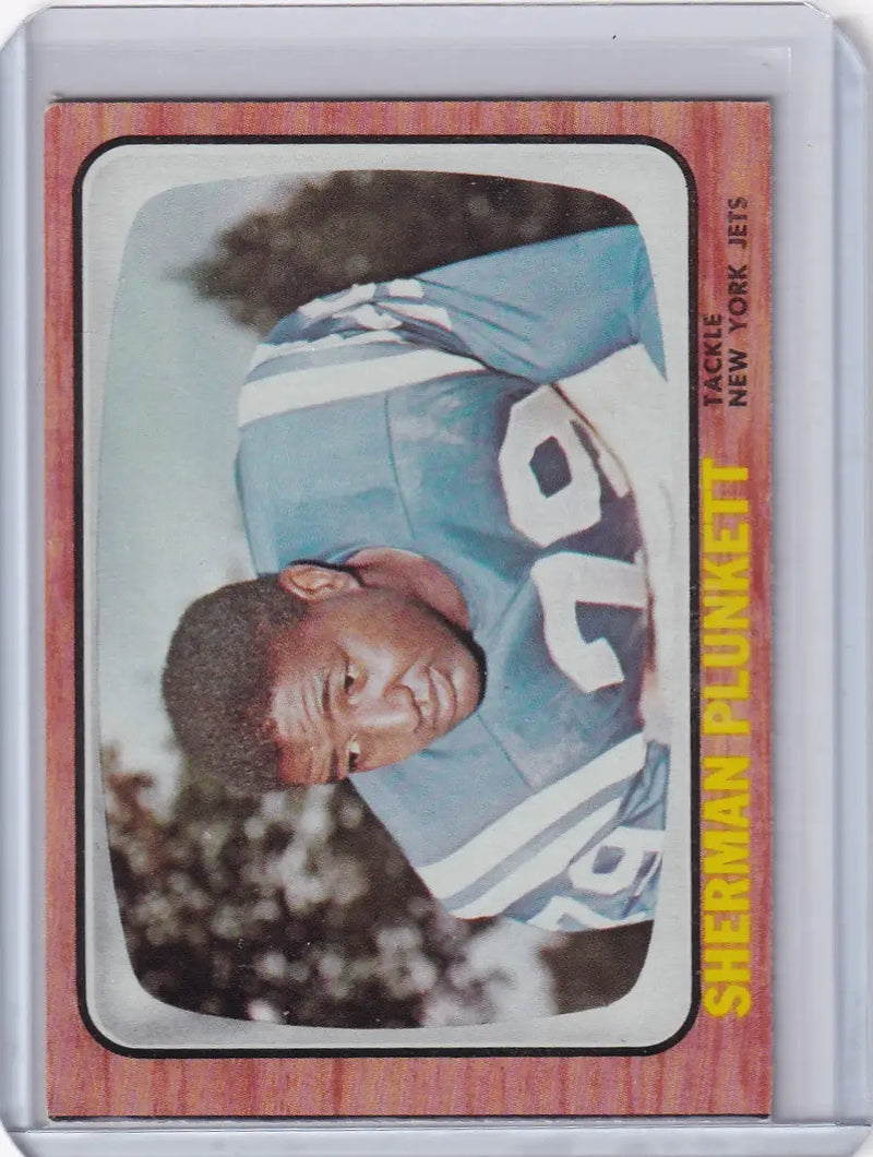 Vintage 1966 Topps Football card of Sherman Plunkett, New York Jets player, jersey number 20