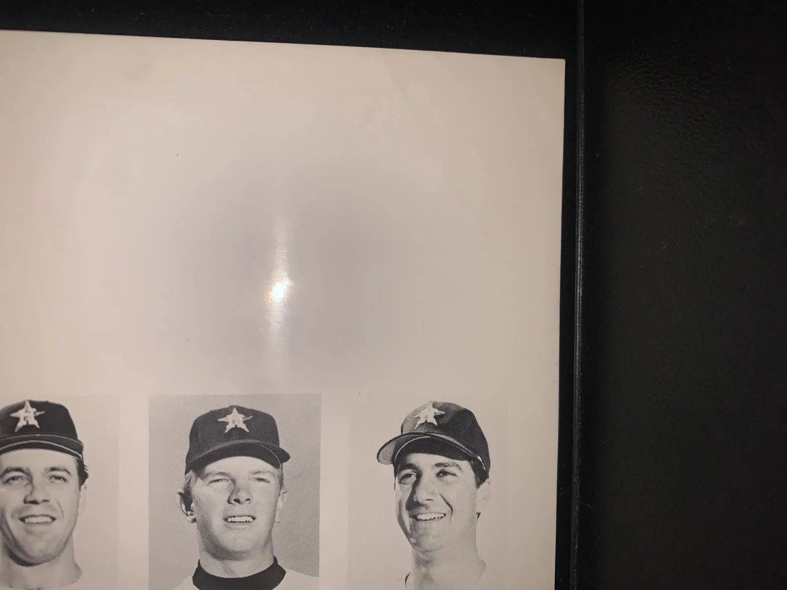 Framed black and white portraits of Houston Astros players, including Joe Morgan