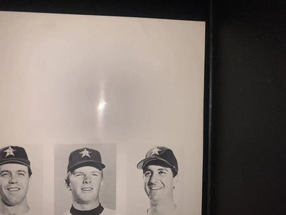 Framed black and white portraits of Houston Astros players, including Joe Morgan