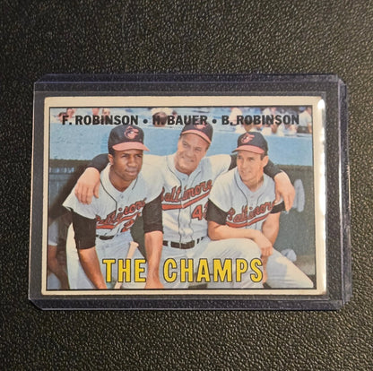 1967 Topps #1 The Champs (Frank Robinson / Hank Bauer / Brooks Robinson