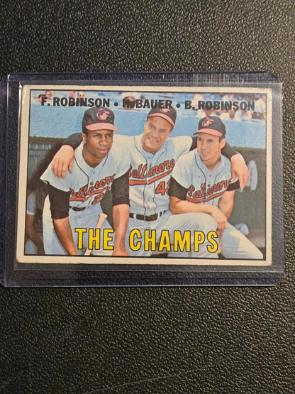 1967 Topps #1 The Champs (Frank Robinson / Hank Bauer / Brooks Robinson