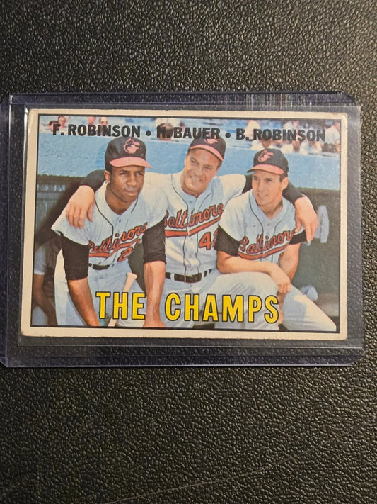 1967 Topps #1 The Champs (Frank Robinson / Hank Bauer / Brooks Robinson