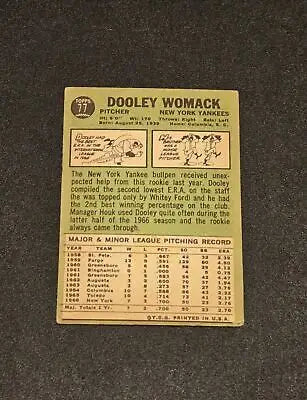 Vintage 1967 Topps #77 Dooley Womack baseball card featuring Dooley Womack pitcher