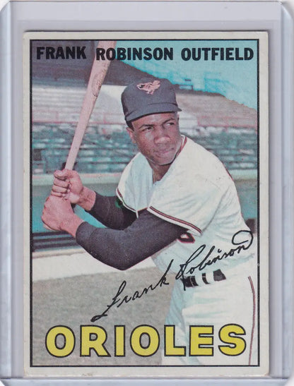 1967 Topps Baseball card of Frank Robinson from the Baltimore Orioles in batting stance