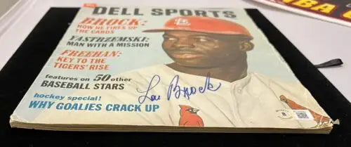 Signed Dell Sports magazine featuring Lou Brock auto with BAS Beckett certification