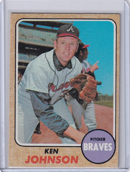 Baseball card of Ken Johnson in throwing stance for Topps Baseball Atlanta Braves