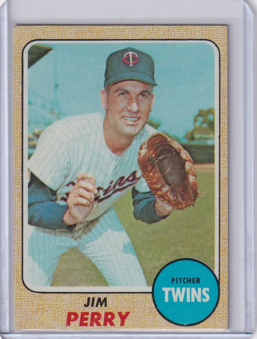 Vintage Topps Baseball card of Jim Perry in throwing stance for Minnesota Twins