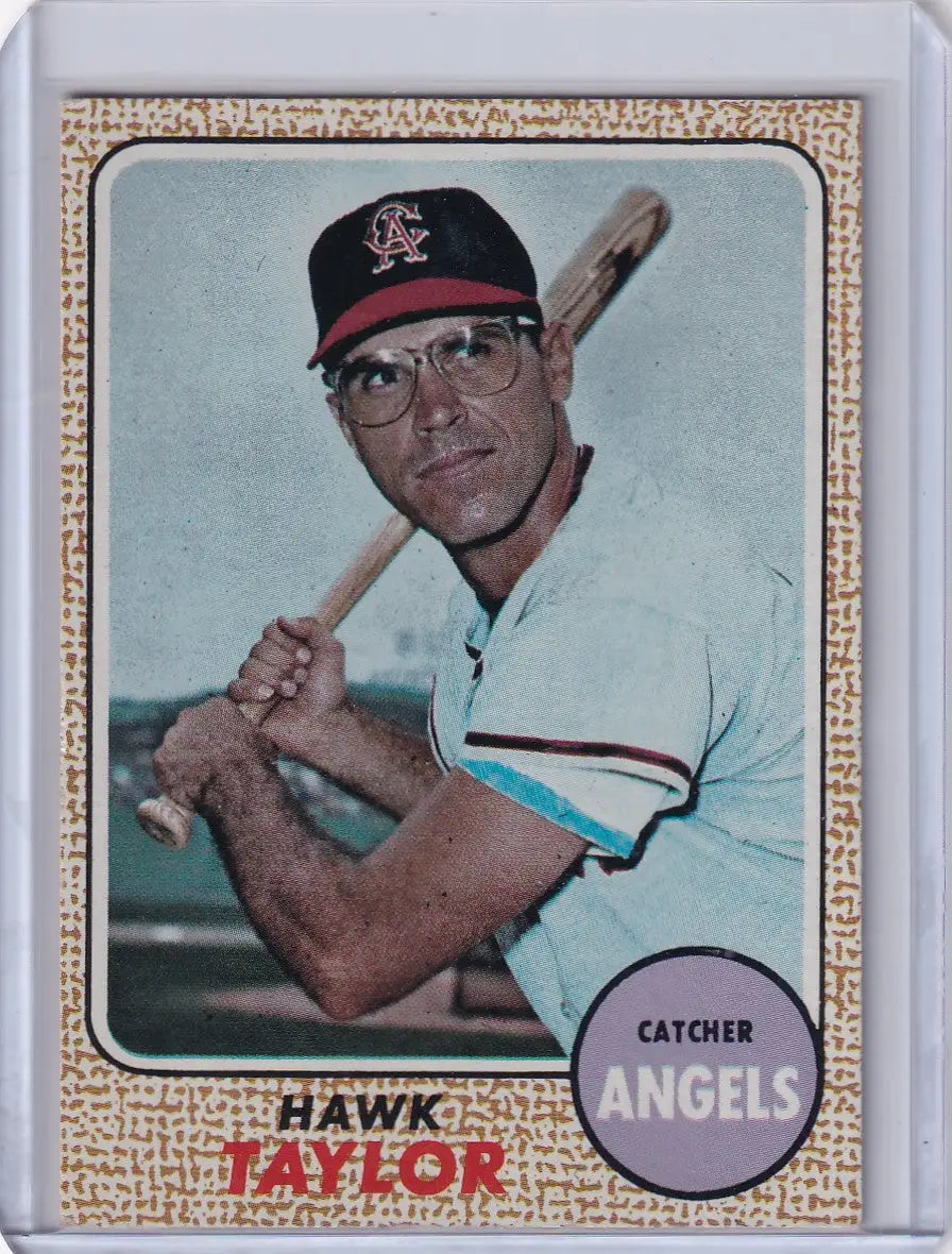 Vintage Topps Baseball card of Hawk Taylor in batting pose for California Angels