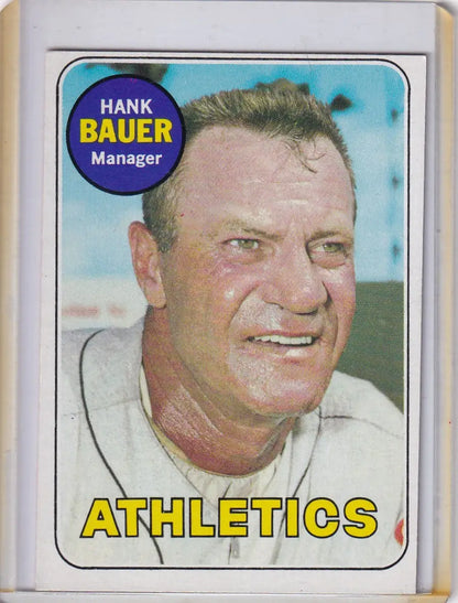 Vintage 1969 Topps Baseball card of Hank Bauer, Oakland Athletics manager in white uniform