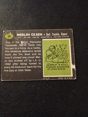 1969 Topps - Merlin Olsen #34. LA Rams. creasing. VG - Football Card Single