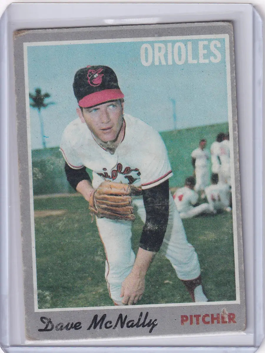 Baseball card of Dave McNally in throwing stance for Topps Baseball and Baltimore Orioles