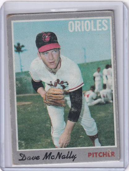 Baseball card of Dave McNally in throwing stance for Topps Baseball and Baltimore Orioles