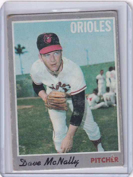 Baseball card of Dave McNally in throwing stance for Topps Baseball and Baltimore Orioles