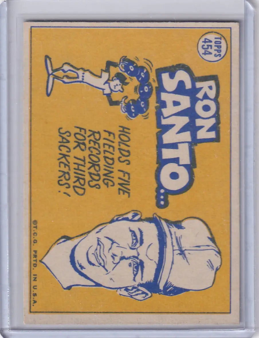 Vintage Topps Baseball card of Ron Santo from the Chicago Cubs with a smiling man’s face