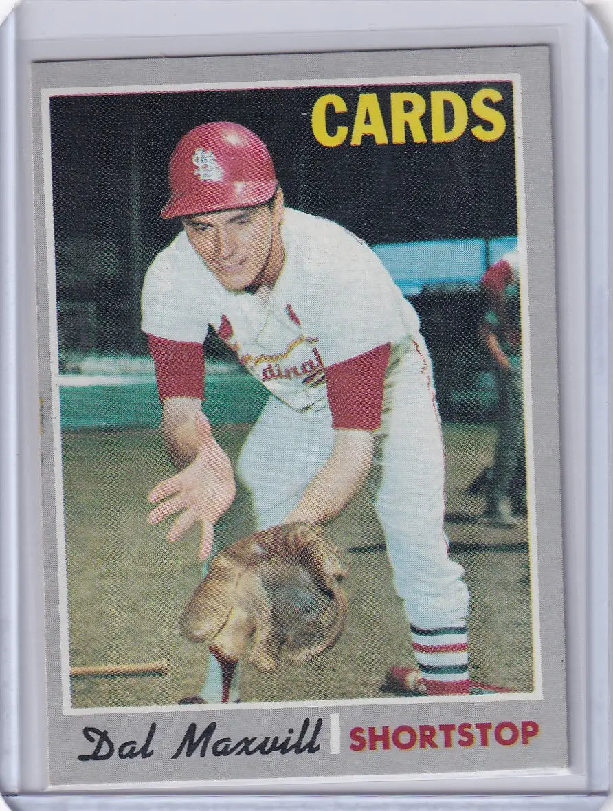 Baseball card of Dal Maxvill fielding for the St. Louis Cardinals by Topps Baseball