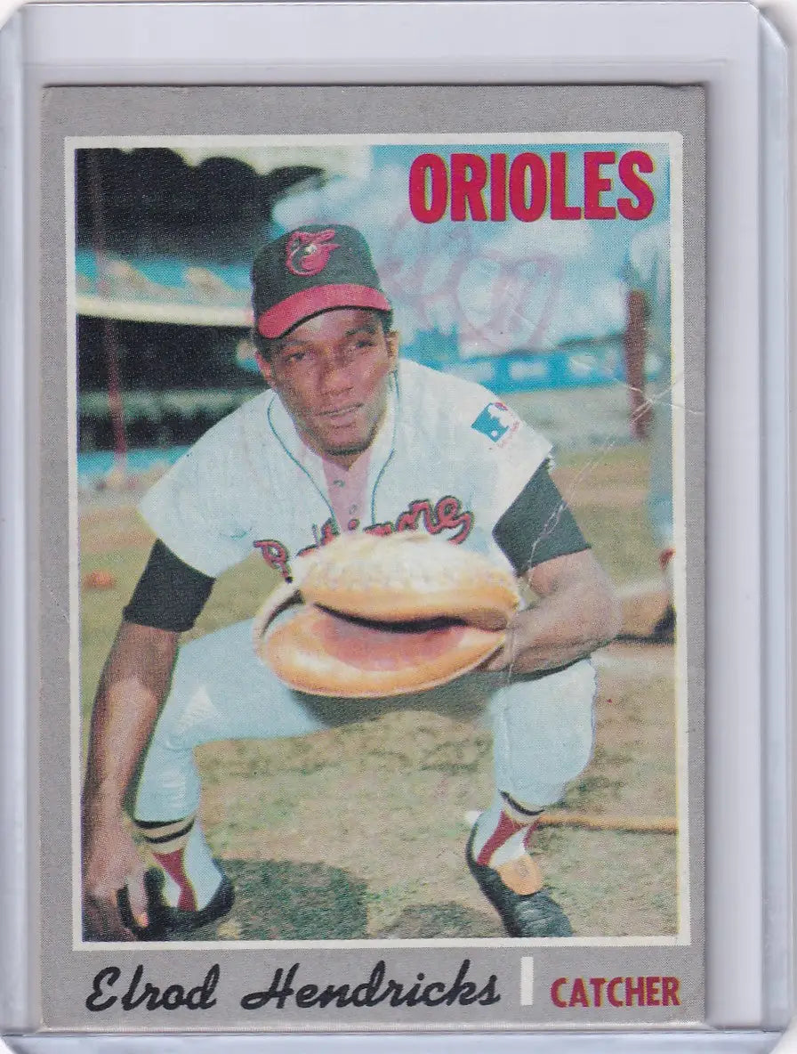 1970 Topps Baseball card of Ellie Hendricks, Baltimore Orioles catcher in crouched position