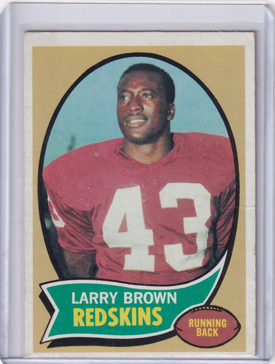 Vintage Topps Football card of Larry Brown in red jersey, Washington Redskins