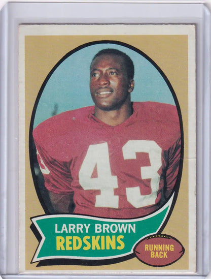Vintage Topps Football card of Larry Brown in red jersey, Washington Redskins