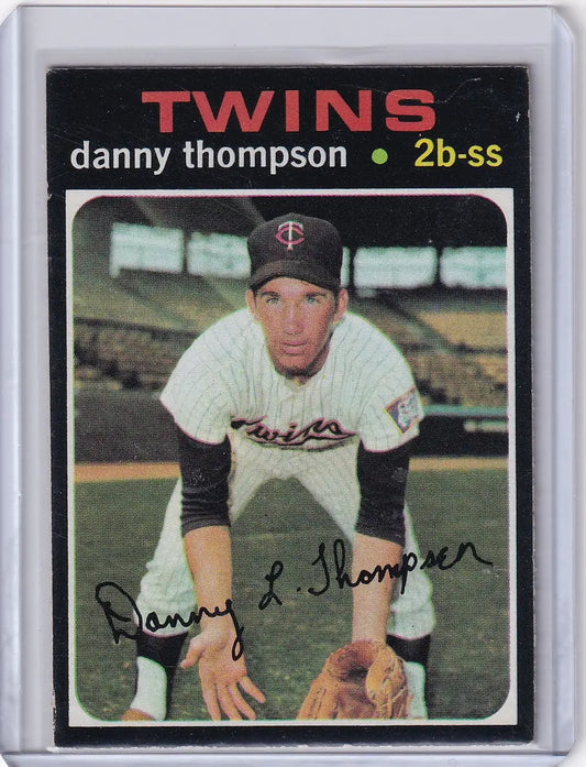 Vintage Topps Baseball card of Danny Thompson crouched fielding for Minnesota Twins